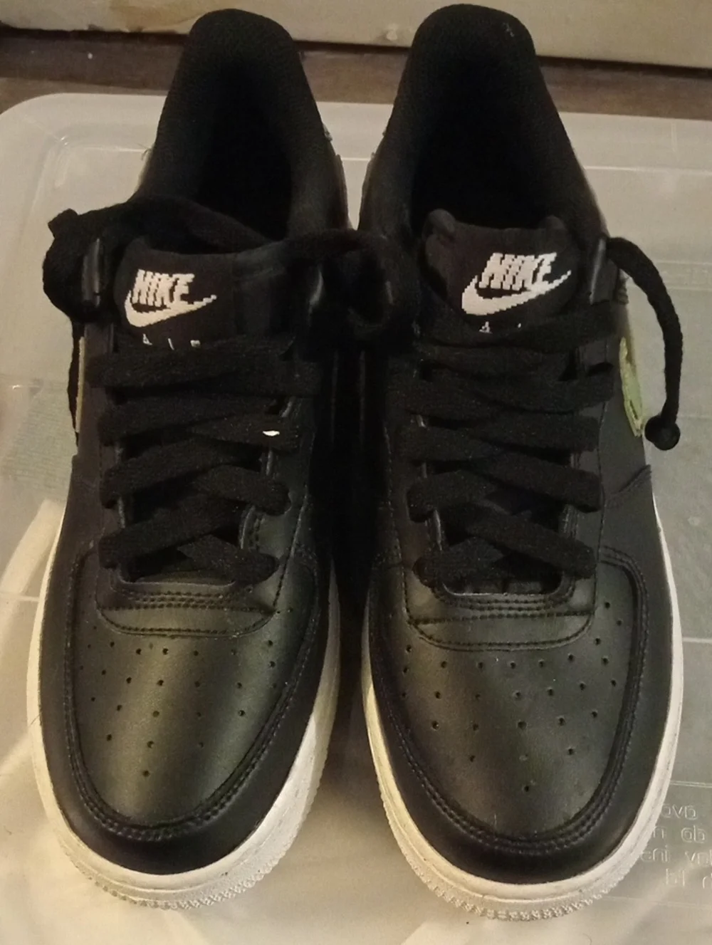 Nike Air Force 1 Black Low-Top Sneakers with White Soles